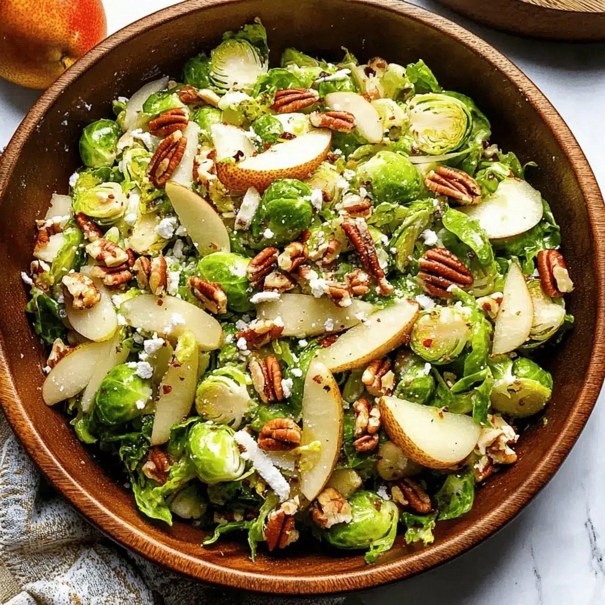 Brussels Salad with Pear and Pecans for a Festive Crunch