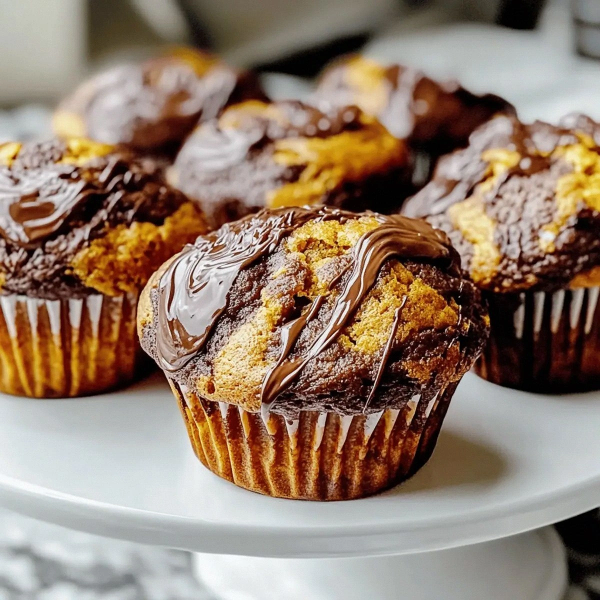 Nutella Swirl Pumpkin Muffins That Warm Your Heart